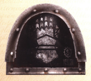 600px-Iron Hands legion pre-heresy shoulderpad.PNG