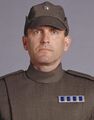 Despite being identified as a clone, this is the actor of Captain Kagi who appeared instead on the bridge of a Star Destroyer as they never shot his scene. If he is a clone, he's simply not one of Jango Fett. If this is displeasing to you, feel free to picture Jango Fett dressed as Howard Hughes.