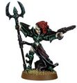 A Female Dracon wielding a spear staff and a stinger pistol.